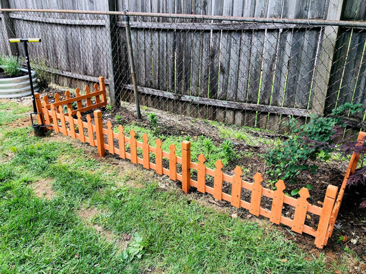 Elevate Your Outdoor Space with an Expandable Wooden Garden Fence